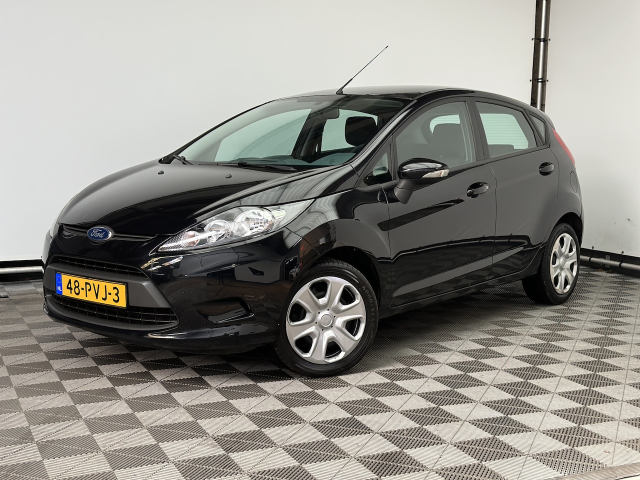 Ford Fiesta - 1.25 Limited 5-drs Airco NL Auto - AutoWereld.nl