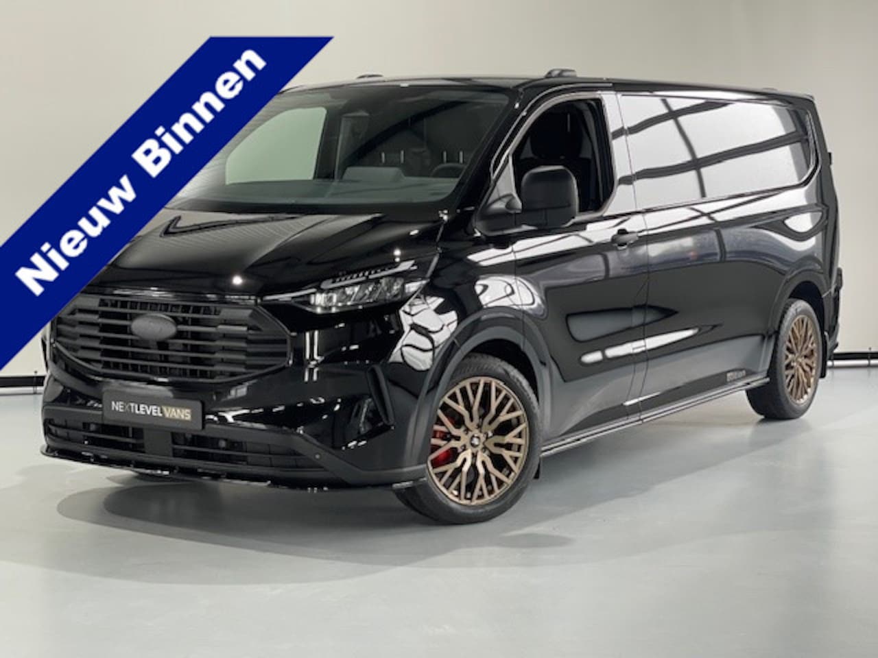 Ford Transit Custom - 300 2.0 TDCI L2H1 170 PK AUTOM PACK PREMIUM - AutoWereld.nl