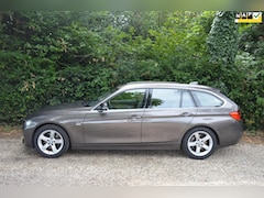 BMW 3-serie Touring - 328i High Exe trekhaak/memory/camera