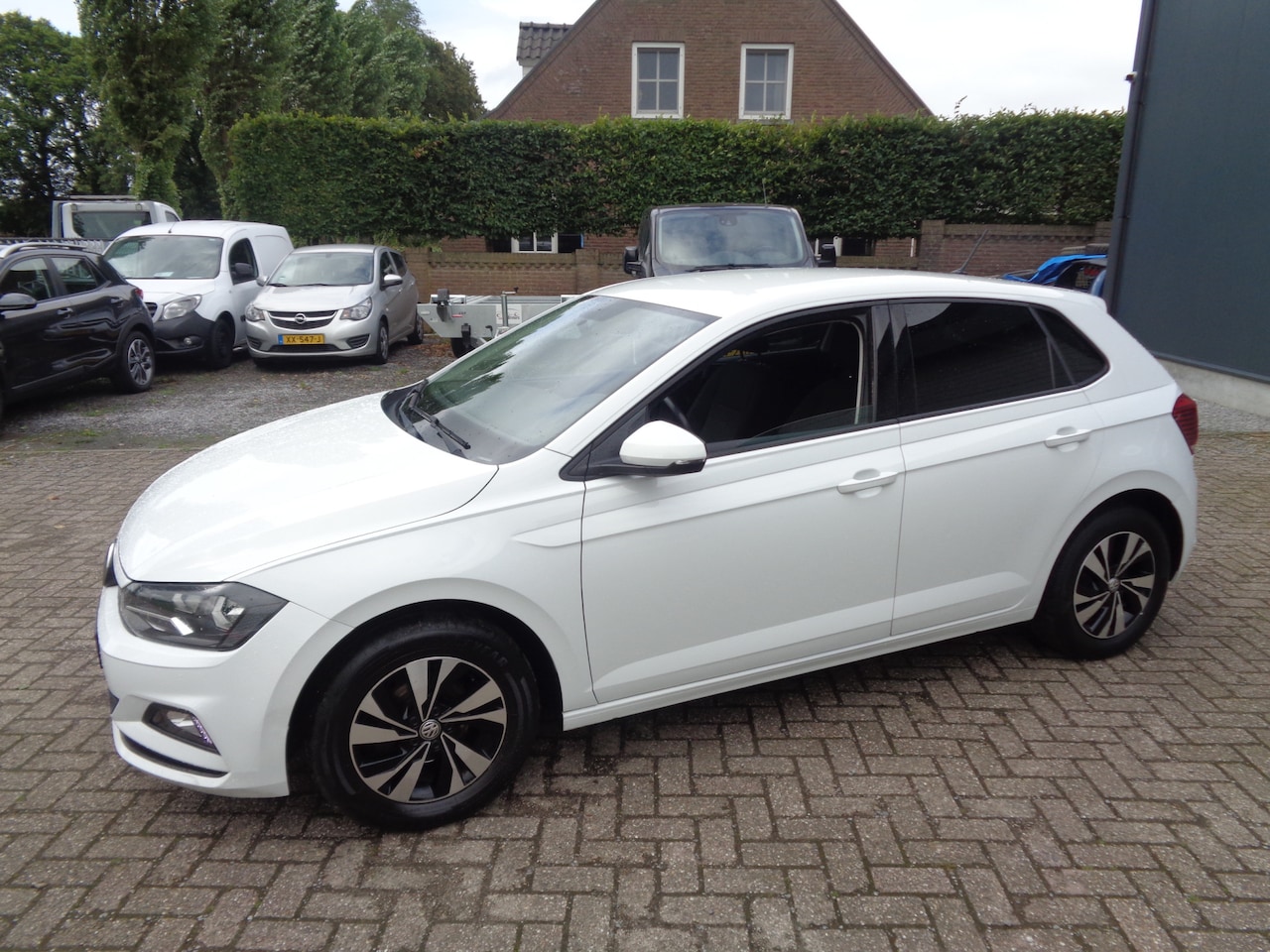 Volkswagen Polo - 1.0 TSI Comfortline Airco, carplay, LM velgen, cruise controle - AutoWereld.nl