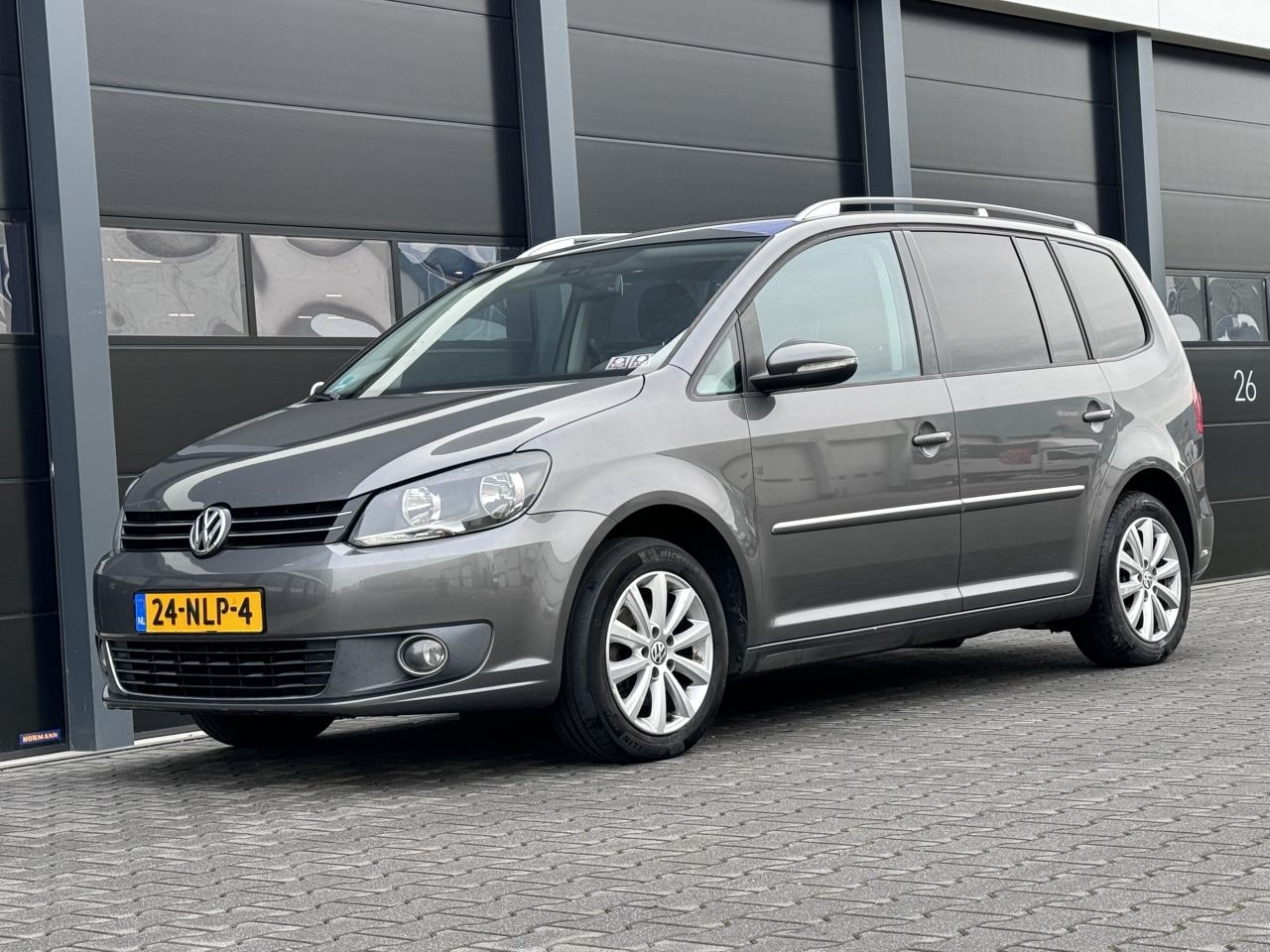 Volkswagen Touran - 1.6 TDI Navi 7-PERS - AutoWereld.nl