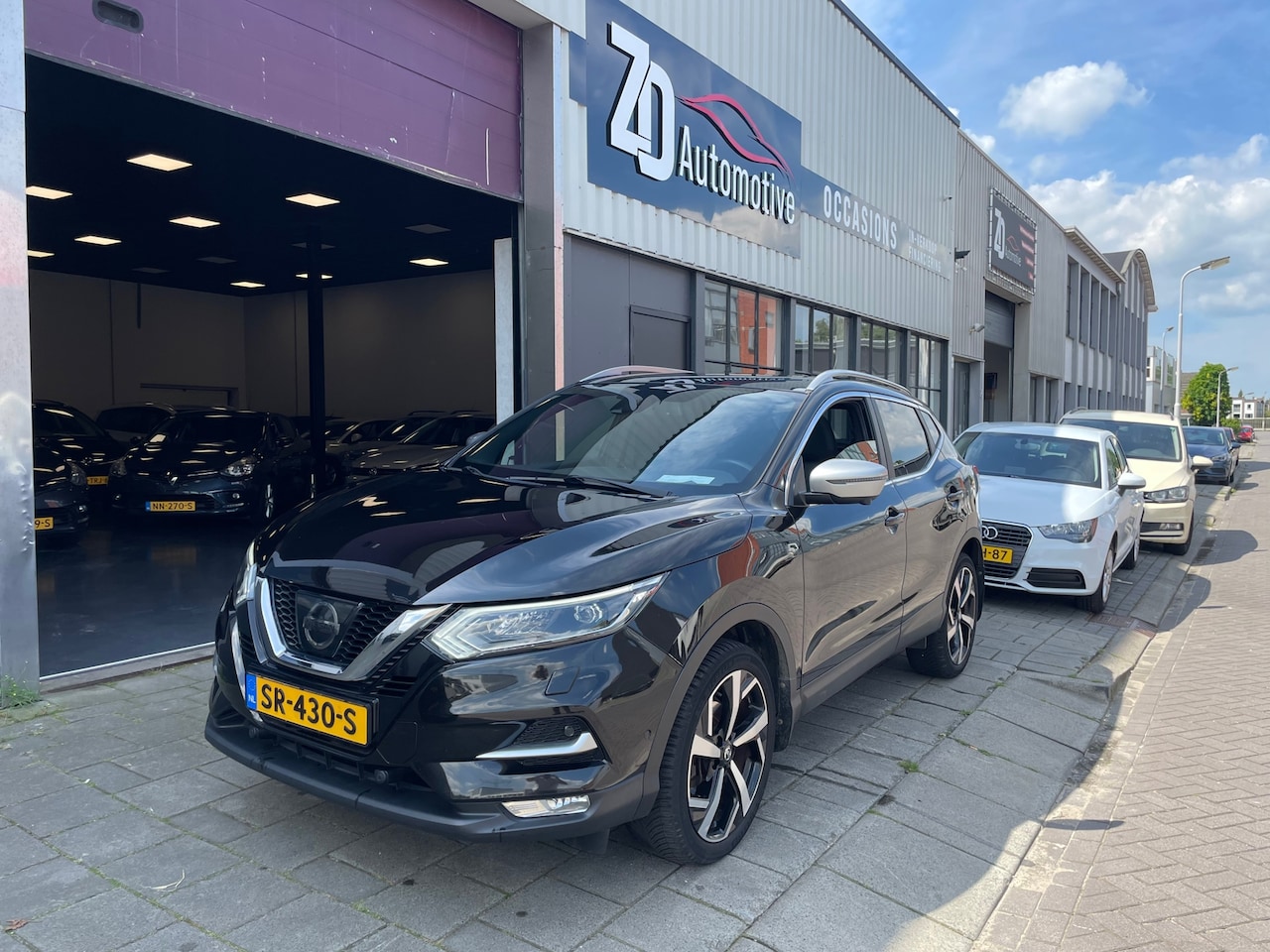 Nissan Qashqai - 1.2 Tekna + Panoramadak Leder Camera - AutoWereld.nl