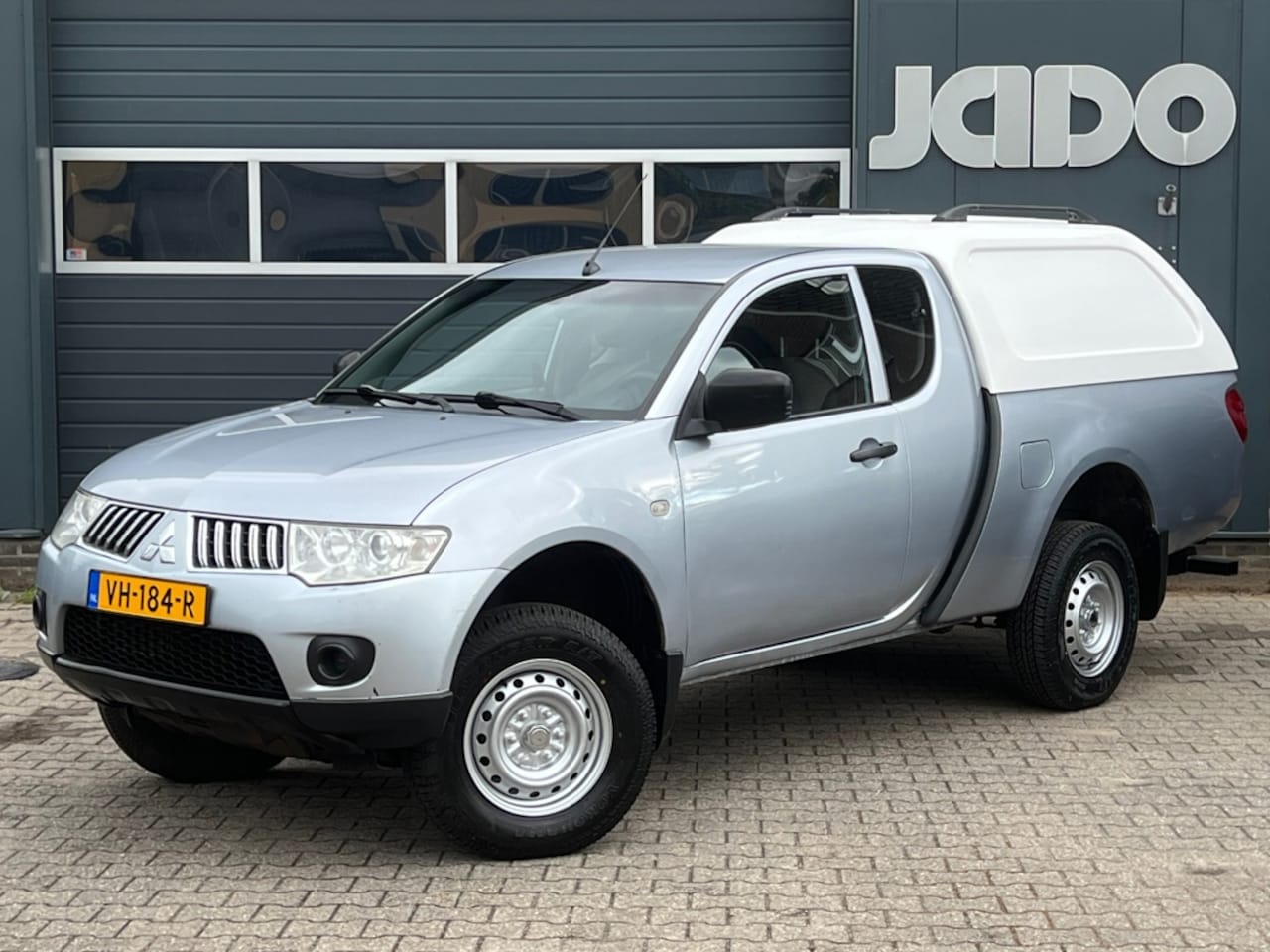 Mitsubishi L 200 - 2.5 DI-D Club Cab 4wd airco-trekhaak 2700kg trekgewicht - AutoWereld.nl