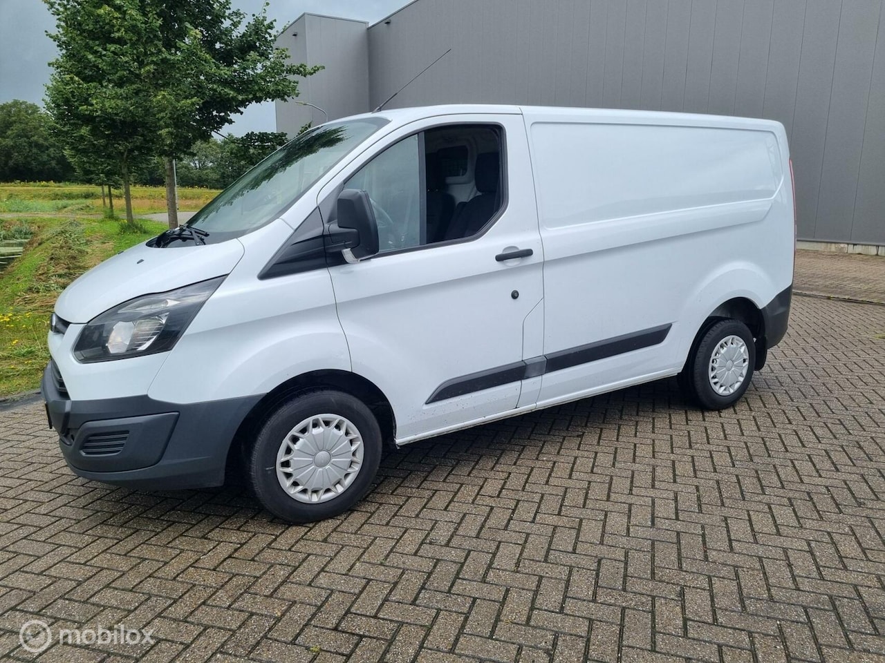 Ford Transit Custom - 250 2.2 TDCI L1H1 - AutoWereld.nl