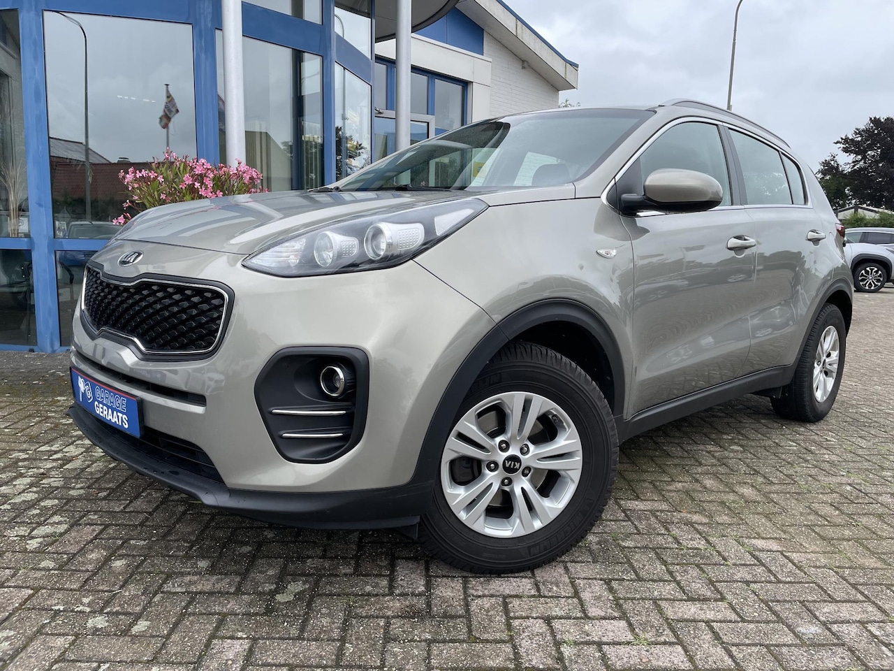 Kia Sportage - 1.6 GDI ComfortLine Navigator 1.6 GDI ComfortLine Navigator - AutoWereld.nl