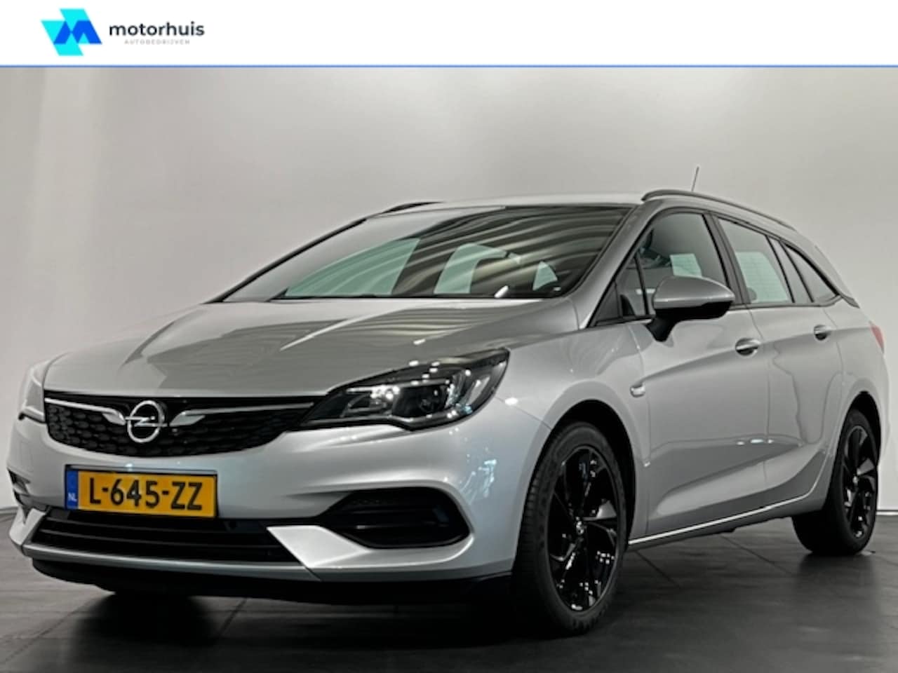 Opel Astra Sports Tourer - 1.4 Turbo 145pk Start/Stop Automaat Edition/navigatie - AutoWereld.nl