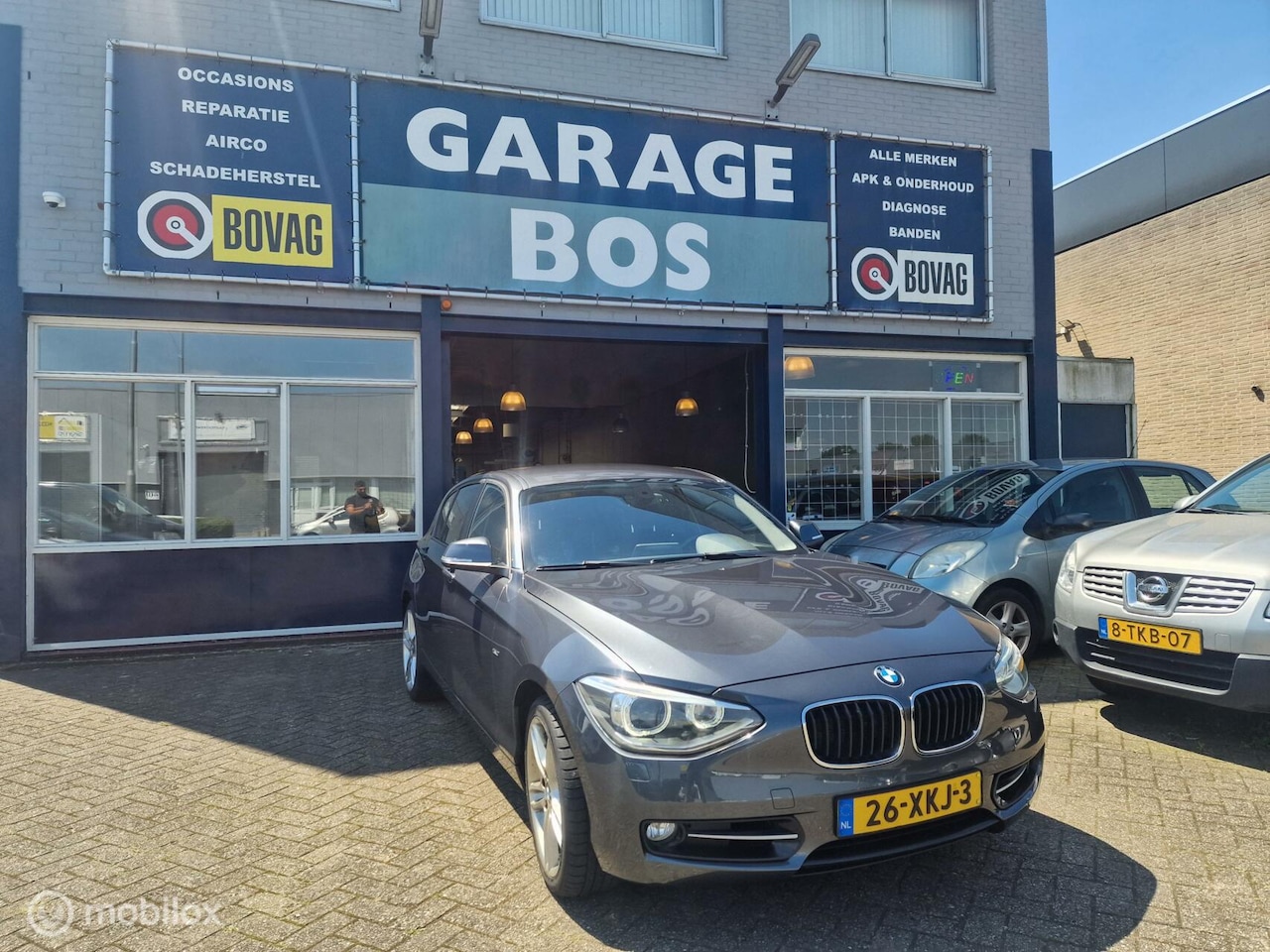 BMW 1-serie - 118i Business Limited Edition/Nap/Navi/Pdc - AutoWereld.nl