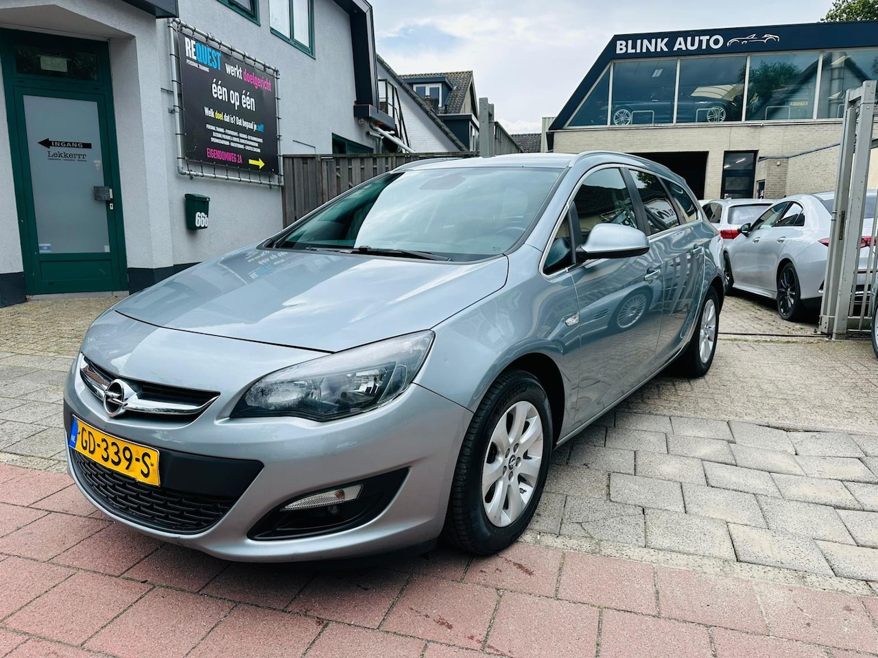 Opel Astra Sports Tourer - 1.4 Turbo Edition Clima/Navi/Garantie - AutoWereld.nl