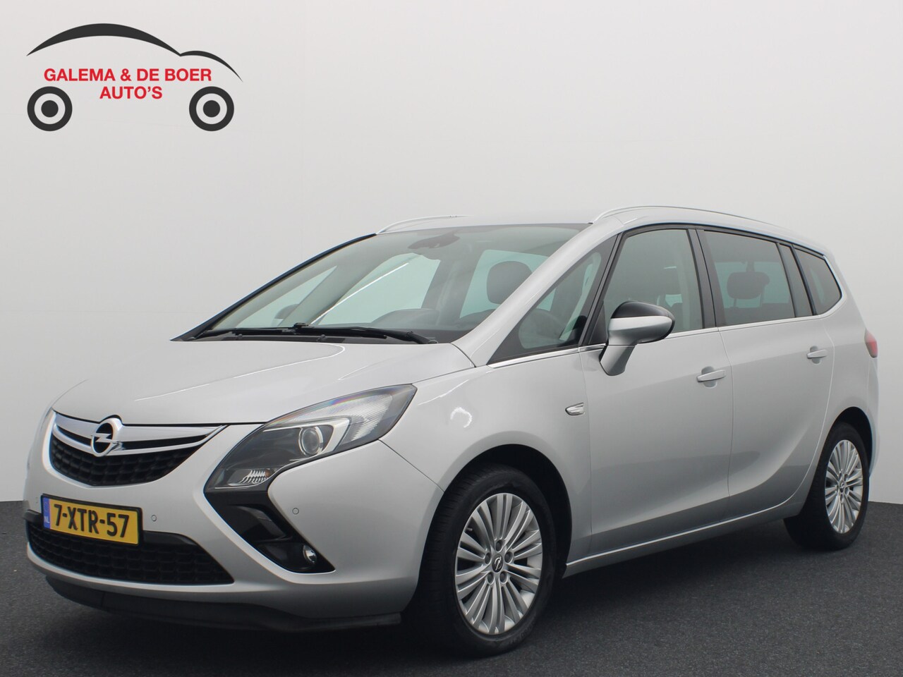 Opel Zafira Tourer - 1.4 140PK Design Edition 7 PERSOONS AUTOMAAT / CAMERA / TREKHAAK / NAVI / CLIMA / PDC / BL - AutoWereld.nl