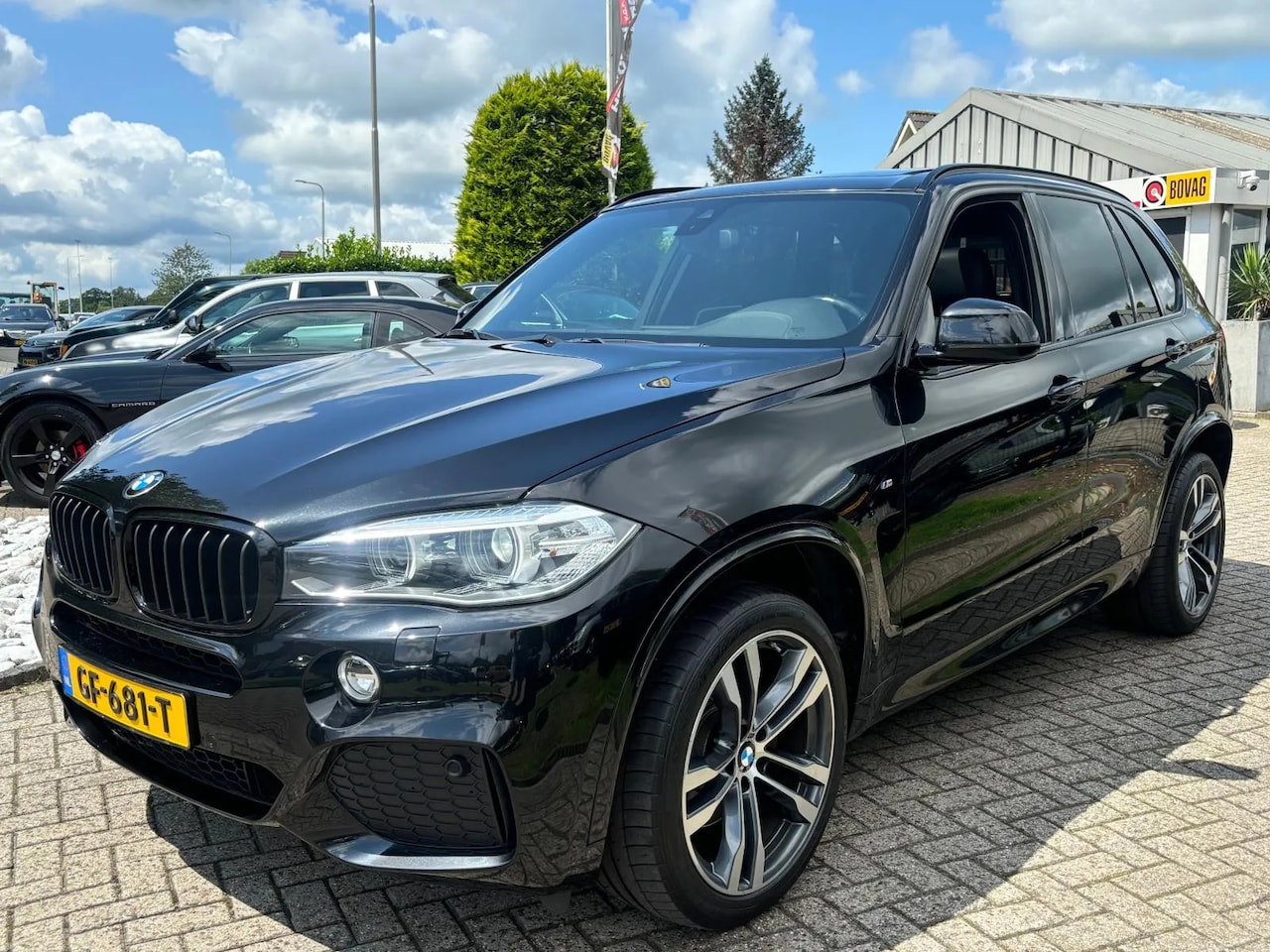 BMW X5 - 4.0D X-Drive 2014 Zwart M-Pakket Panoramdak - AutoWereld.nl