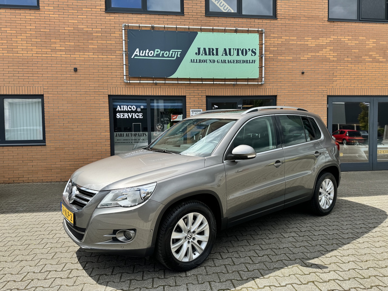 Volkswagen Tiguan - 1.4 TSI Sport&Style Zeer mooi, Clima, trekhaak - AutoWereld.nl