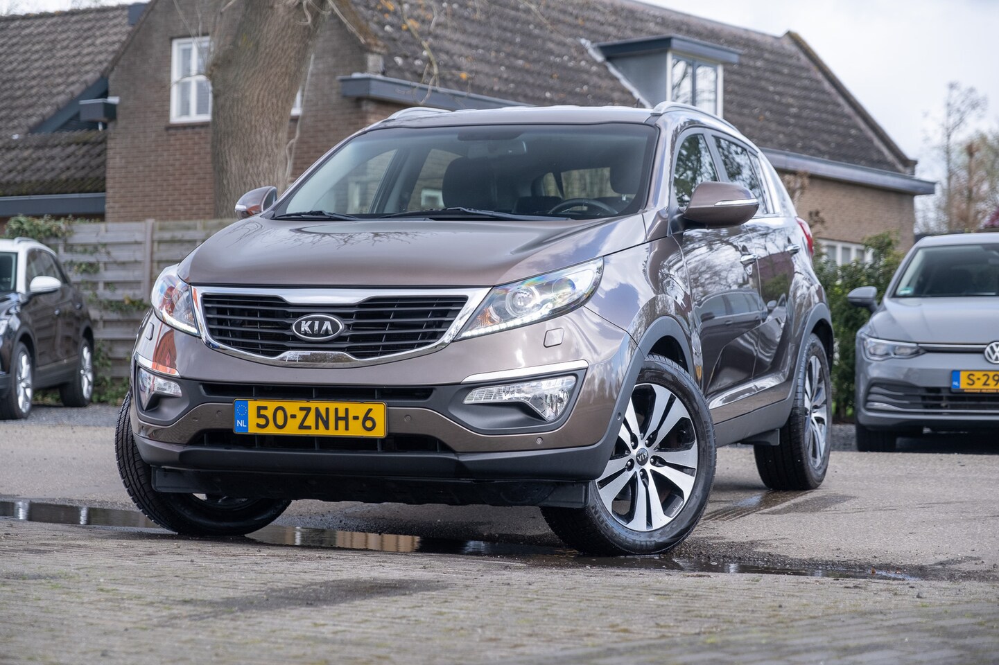 Kia Sportage - 2.0 CVVT 163pk Aut. Plus Pack AU - AutoWereld.nl