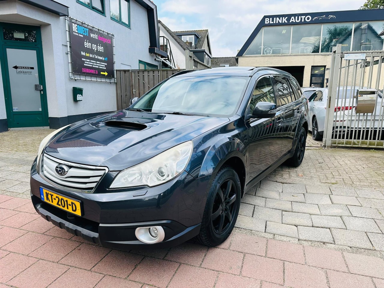 Subaru Legacy Touring Wagon - 2.0D Luxury Clima/schuifdak/nav/Garantie - AutoWereld.nl