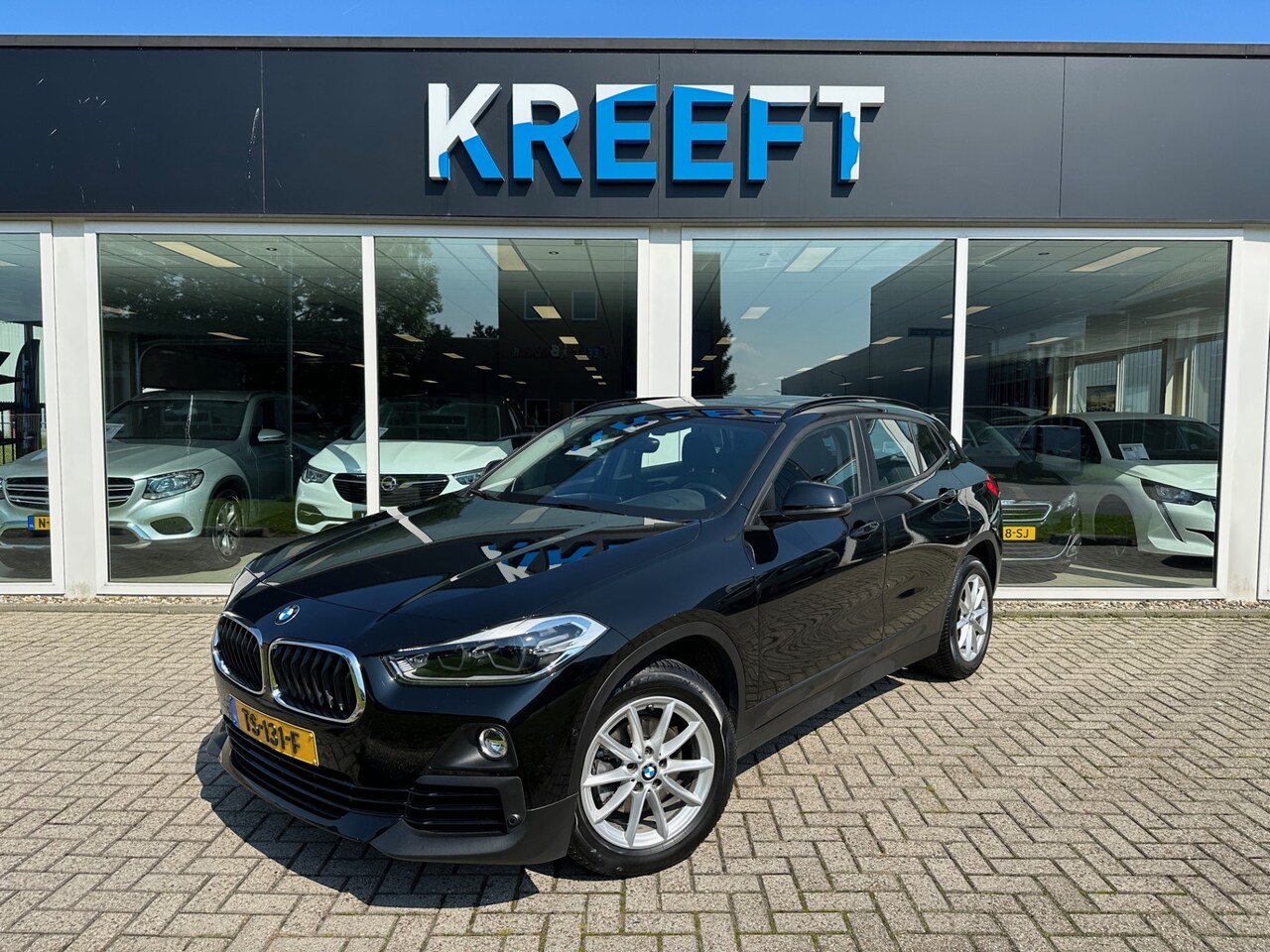 BMW X2 - sDrive18i Executive Schuifdak - AutoWereld.nl