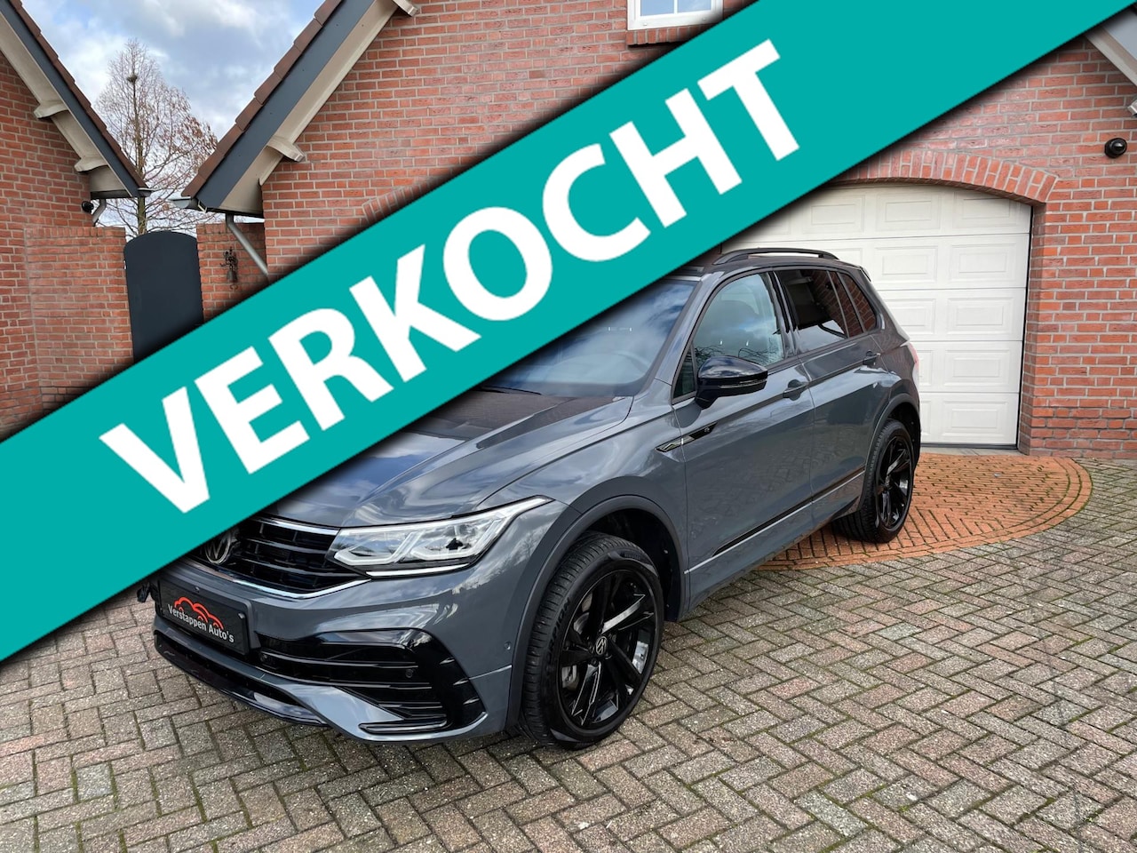 Volkswagen Tiguan - 2.0 TDI R-Line 200PK *DGS-HEAD-UP-CAMERAS* - AutoWereld.nl