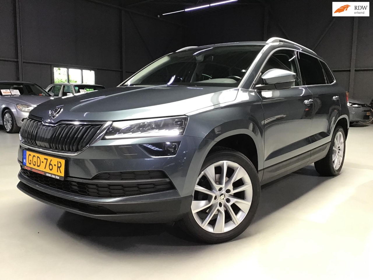 Skoda Karoq - 1.5 TSI ACT Sportline Business I Compl. Dealer Onderh I Clima & Cruise Cntr I Navi I Led I - AutoWereld.nl