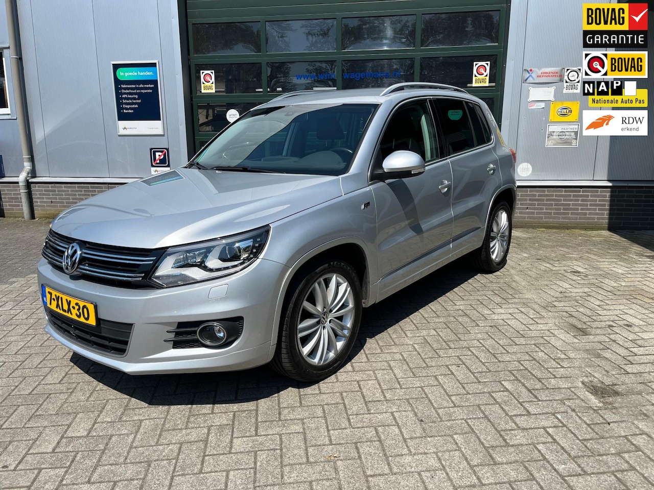 Volkswagen Tiguan - 2.0 TSI Sport&Style 5-Deurs Automaat - AutoWereld.nl