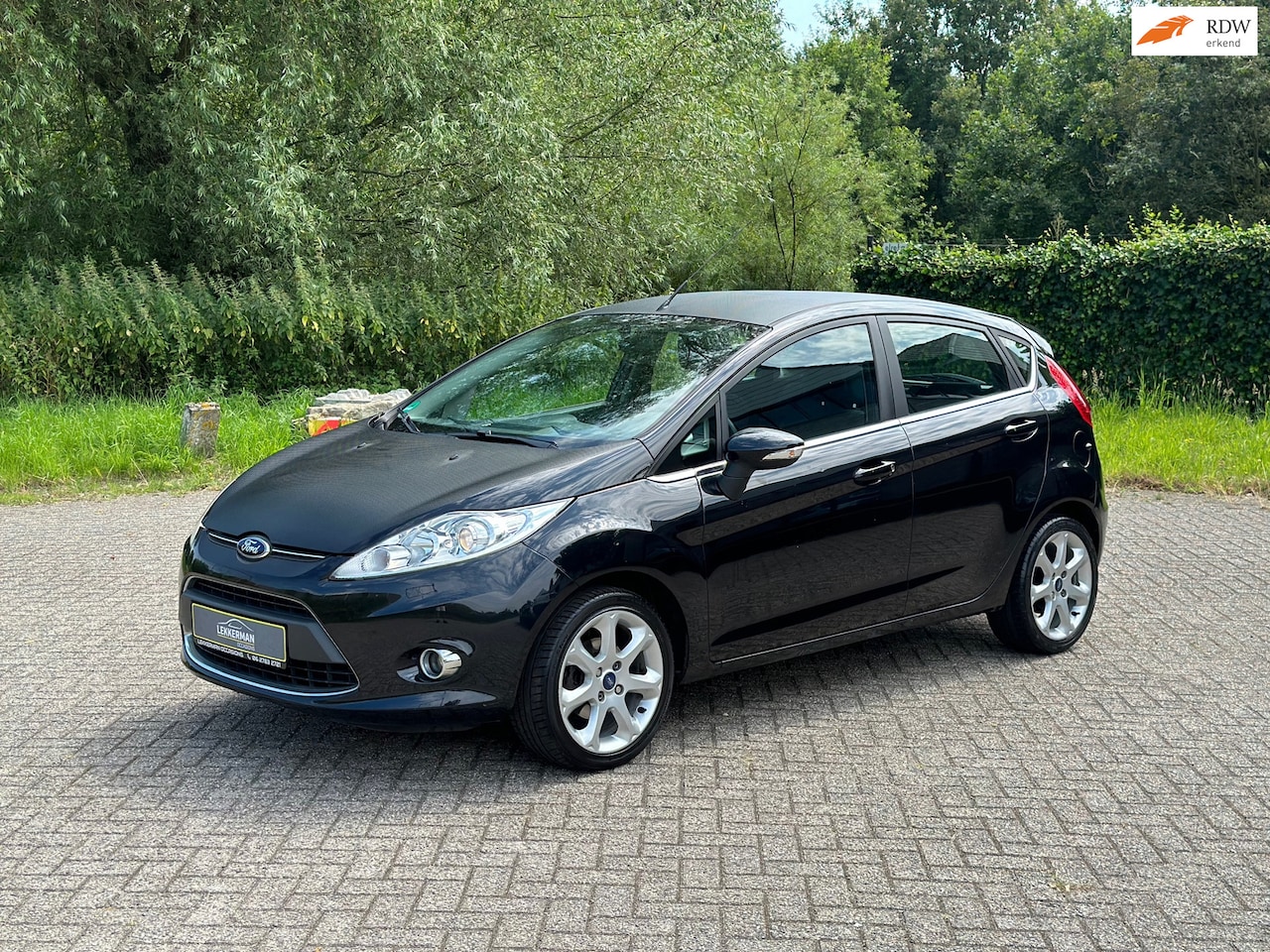 Ford Fiesta - 1.25 Titanium 82PK I VOORUITVERW I NWE DIS RIEM +POMP - AutoWereld.nl