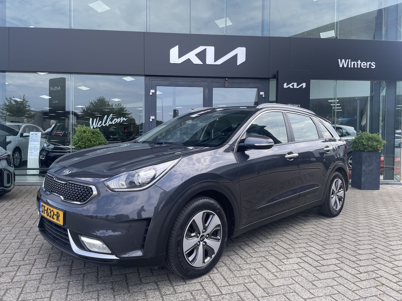 Kia Niro - 1.6i-16V Hybrid DynamicLine DCT6/Autom. ECC-Airco Cr.Control Navi+Camera+BT+USB 16"LMV Tre - AutoWereld.nl