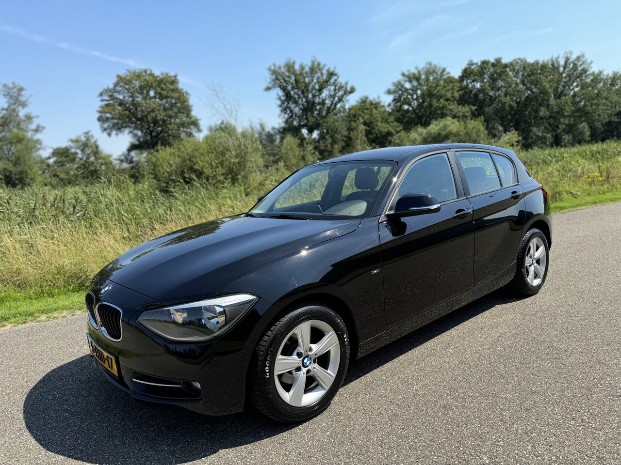 BMW 1-serie - 116d SPORT SPORTLiNE ORG.NL*NAP*NAVi! - AutoWereld.nl