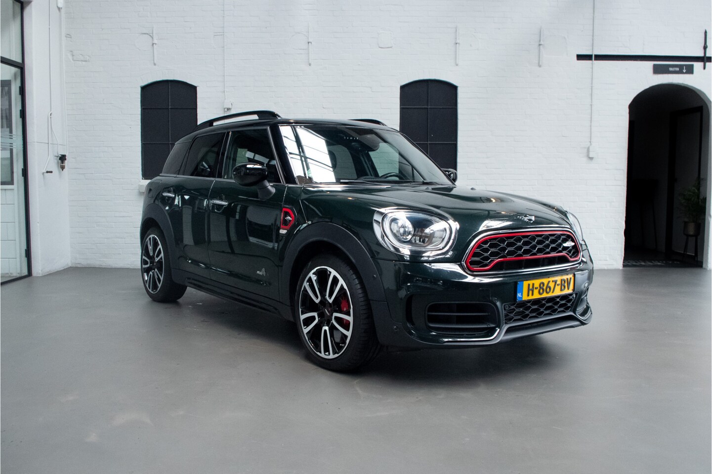 MINI Countryman - Mini 2.0 John Cooper Works ALL4 Chili PANO / LEER / HEAD-UP / NL AUTO - AutoWereld.nl