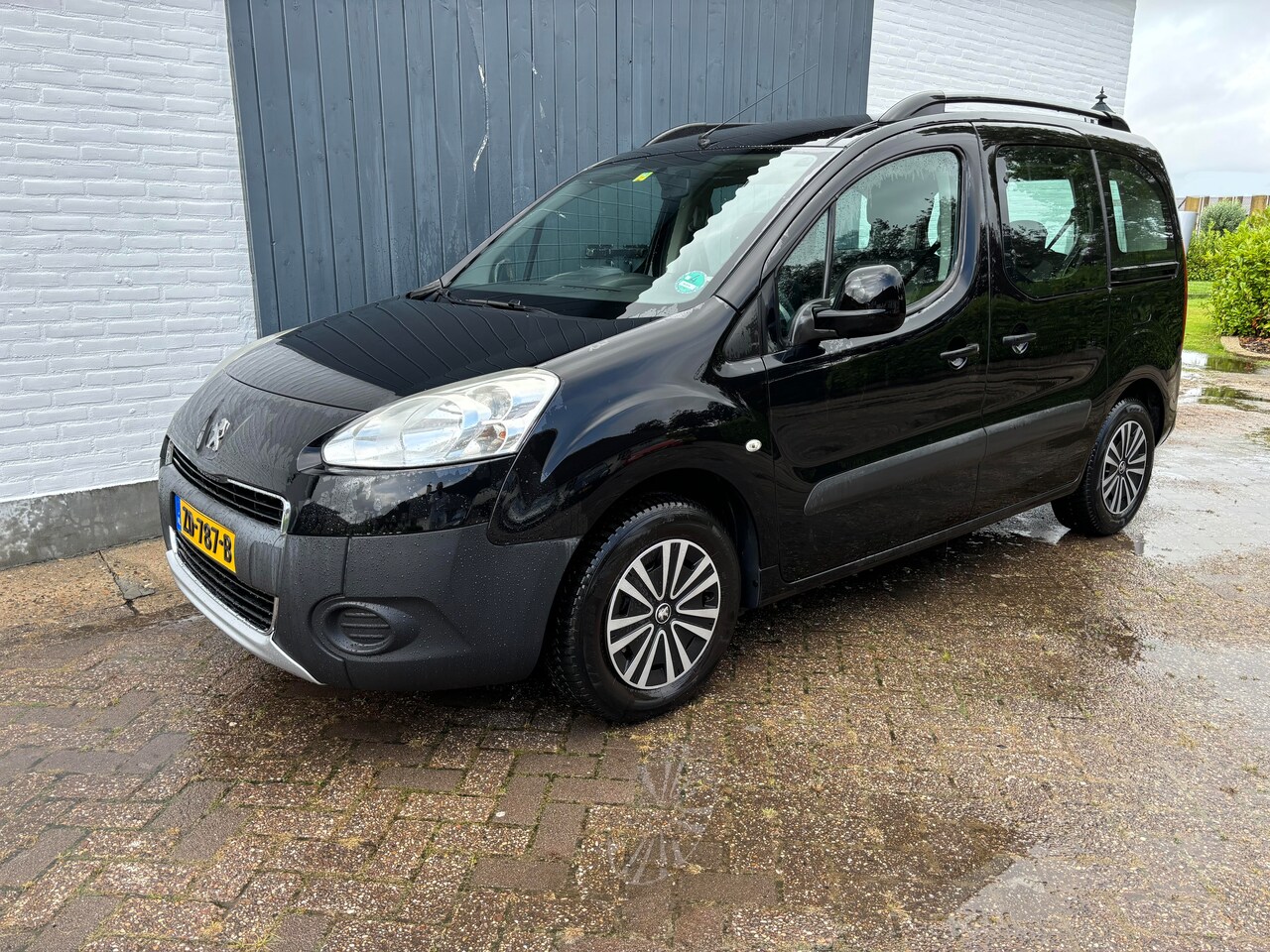 Peugeot Partner Tepee - 1.6 VTi Style 120pk Tepee 2-eigenaar 2015 Zwart - AutoWereld.nl