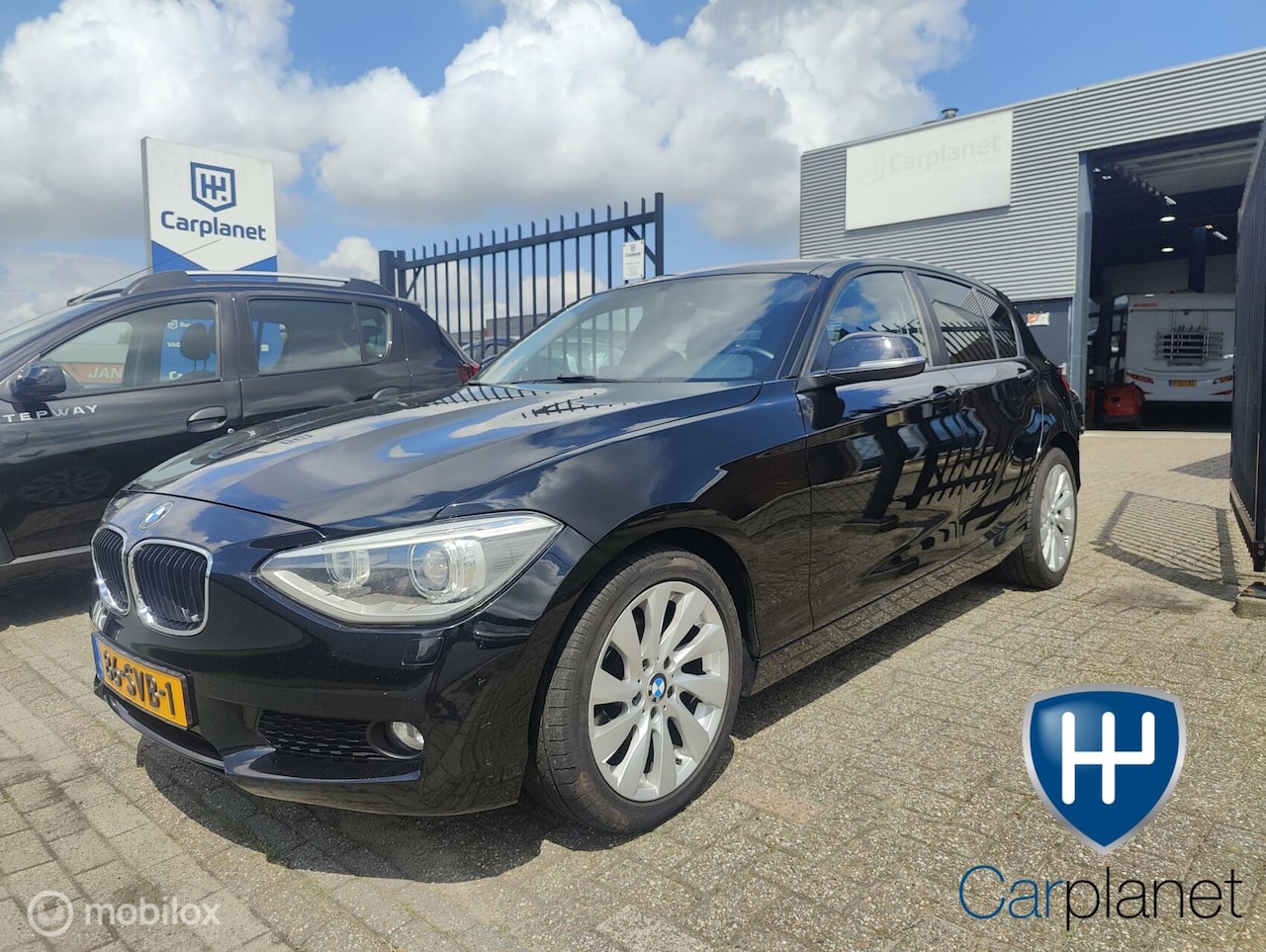 BMW 1-serie - 116i Xenon, Navigatie, 6versnellingen - AutoWereld.nl