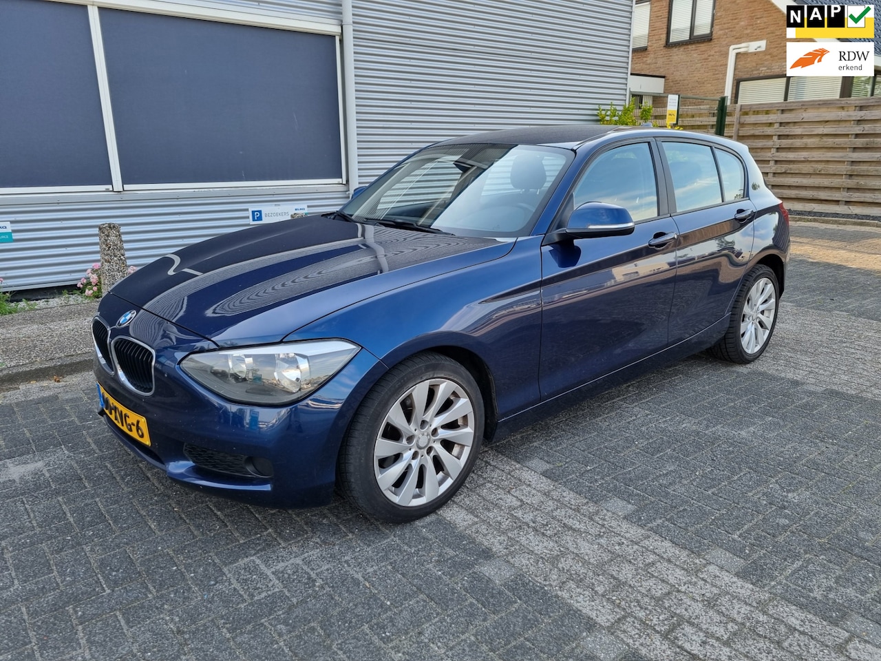 BMW 1-serie - 118i 5-drs Automaat Clima! Cruise Bj:2012 NAP! - AutoWereld.nl