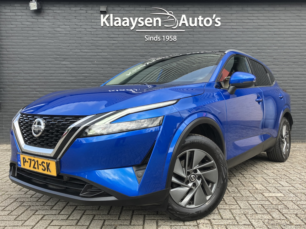 Nissan Qashqai - 1.3 MHEV 140 pk Acenta | dealer onderhouden | panoramadak | trekhaak | apple carplay | key - AutoWereld.nl