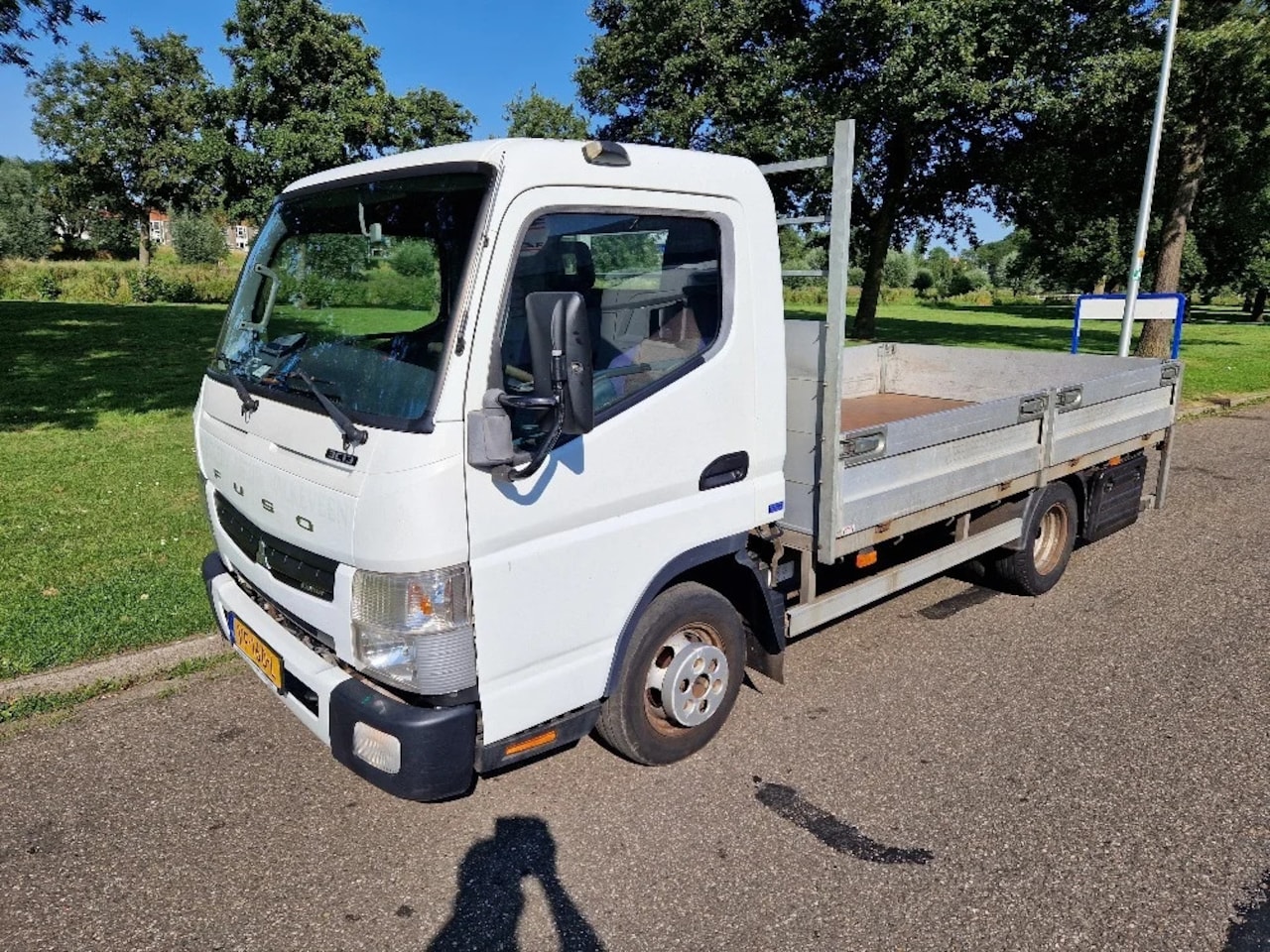 Fuso Canter - 3C13 / AMT / 280 Open laadbak met Trekhaak 3500 Kg - AutoWereld.nl