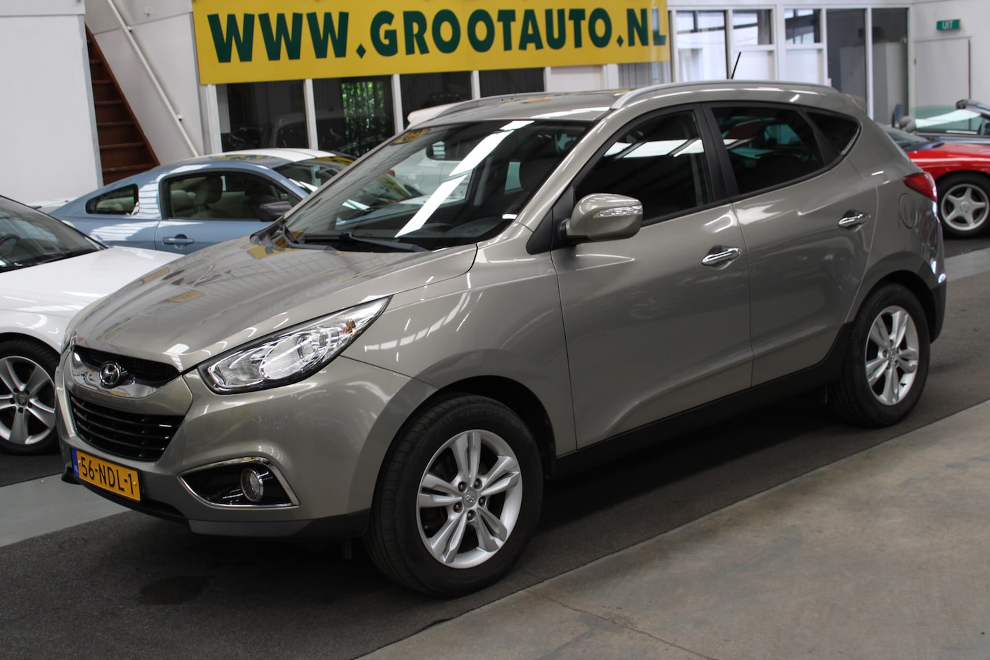 Hyundai ix35 - 2.0i Style Airco, Cruise control, Trekhaak, Navi - AutoWereld.nl