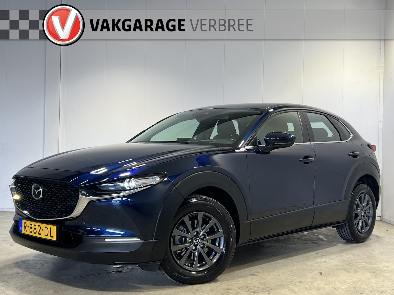 Mazda CX-30 - 2.0 e-SkyActiv-G M Hybrid Comfort | Navigatie | LM Velgen 16" | Voorstoelen + Stuur Verwar - AutoWereld.nl