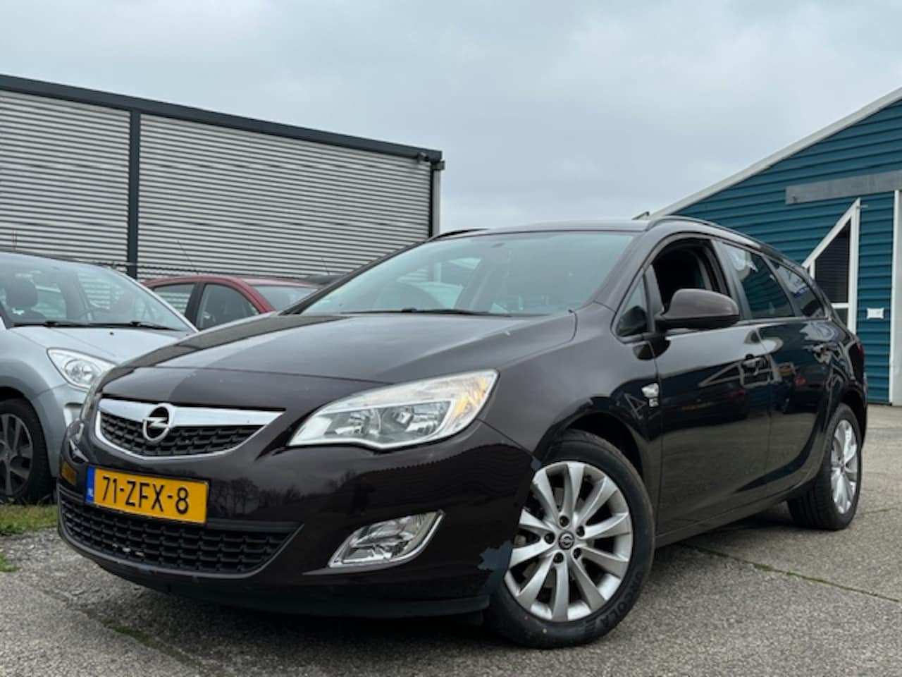 Opel Astra Sports Tourer - 1.7 CDTi Cosmo I Airco I LMV - AutoWereld.nl