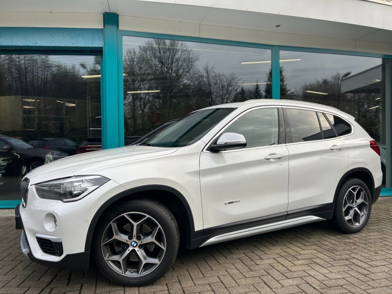 BMW X1 - 18i X-LINE SPORT, Navi, Leder Sportstoelen, LED, 18'', Cruise, P - AutoWereld.nl