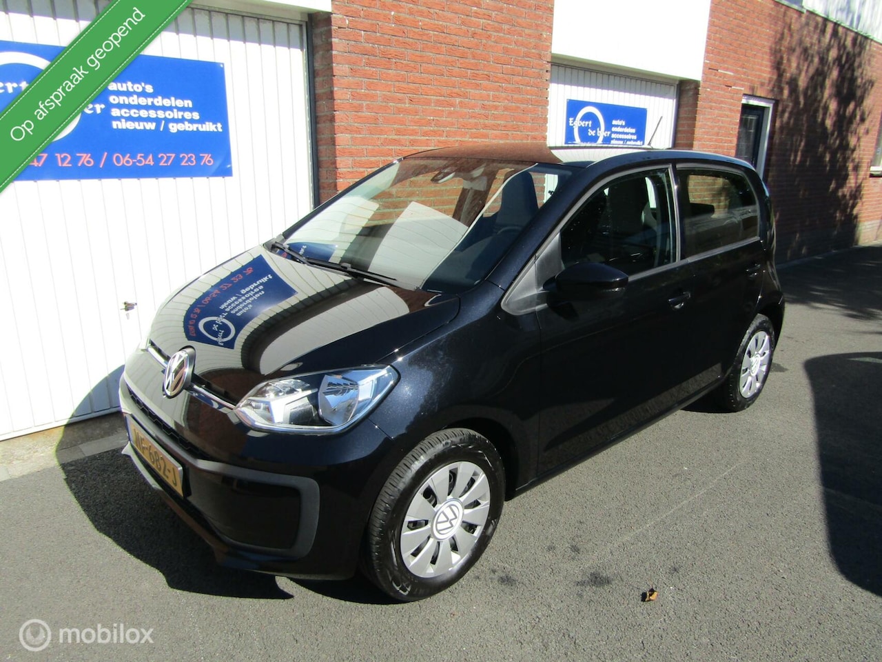 Volkswagen Up! - zwart 1.0 BMT move up! 2017 en maar 147549 km - AutoWereld.nl