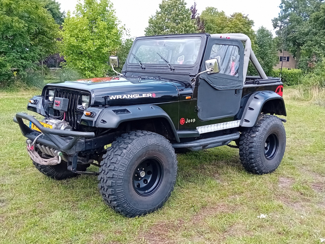 Jeep Wrangler - 4.0i Wagon 4.0i Wagon - AutoWereld.nl