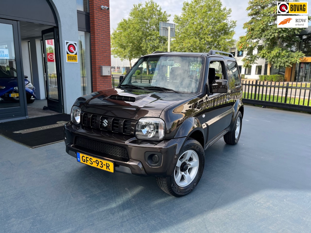 Suzuki Jimny - 1.3 Exclusive 4x4 AUTOMAAT AIRCO LMV - AutoWereld.nl