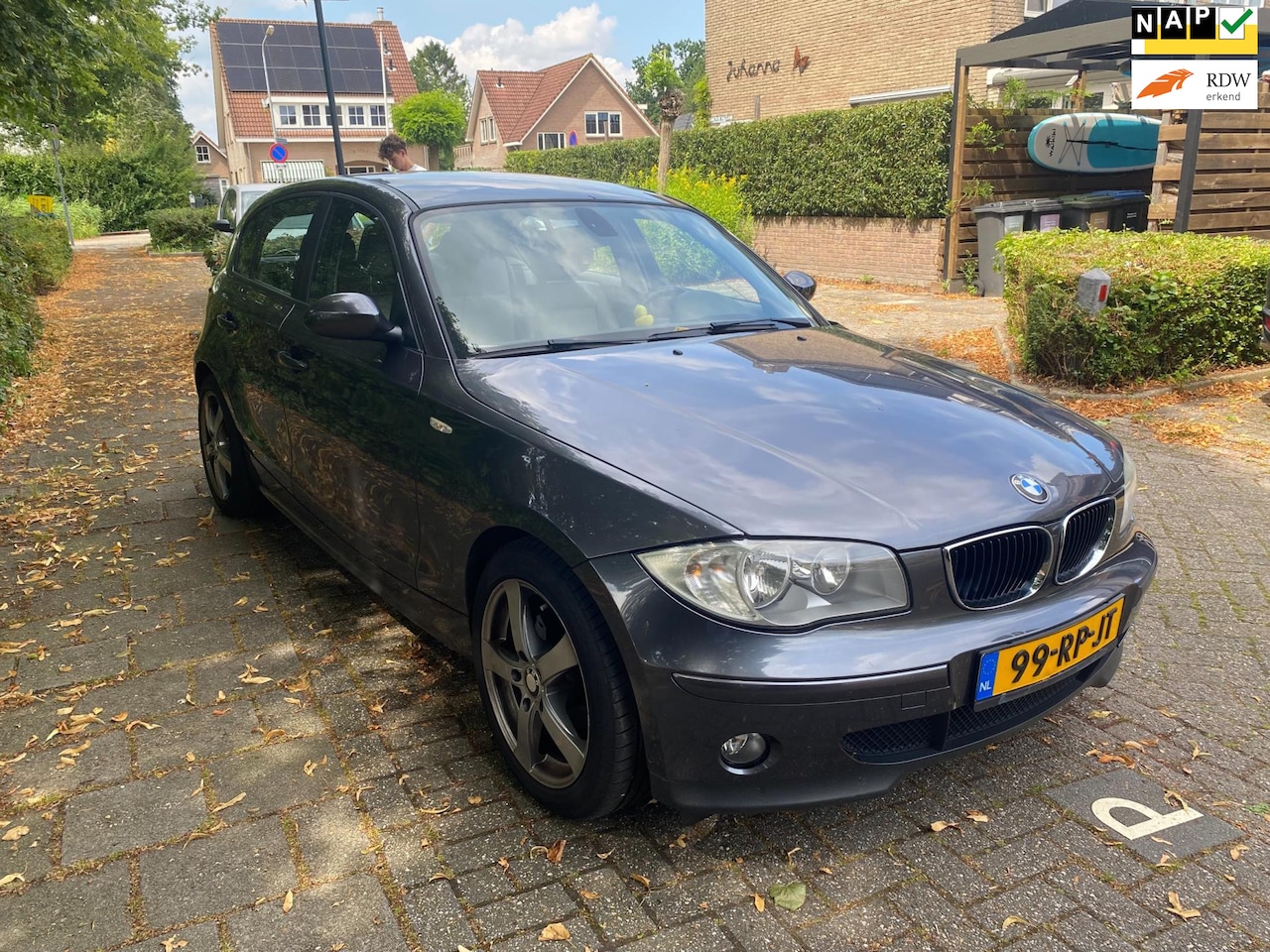 BMW 1-serie - 118i High Executive met leer, airco en 17" NAP - AutoWereld.nl