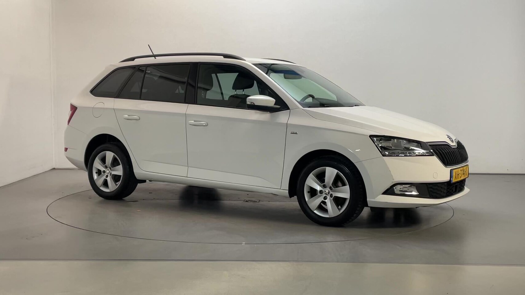 Skoda Fabia Combi - 1.0 TSI Clever Climate Control Parkeersensoren DAB+ Navigatie - AutoWereld.nl