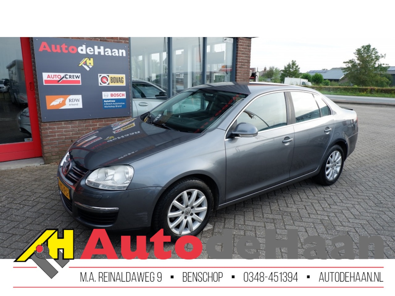 Volkswagen Jetta - 1.6 FSI Comfort 1e Eig./Dealeroh/Cruise/Clima/Trekhaak/LM - AutoWereld.nl