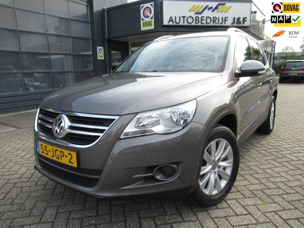 Volkswagen Tiguan - 1.4 TSI Sport&Style 4Motion / 2x PDC / Trekhaak - AutoWereld.nl