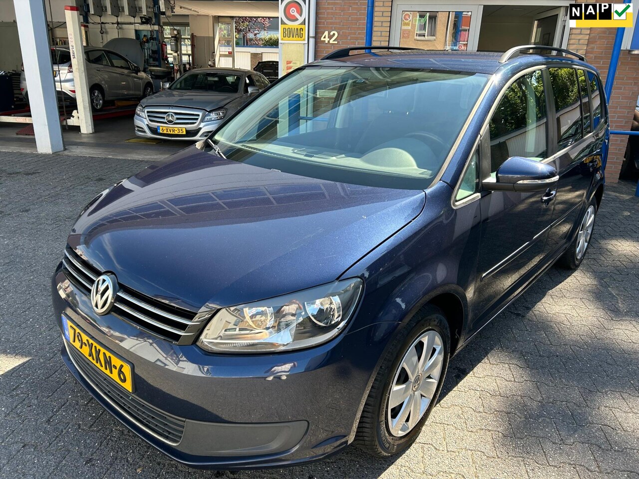 Volkswagen Touran - 1.2 TSI Comfortline BlueMotion | 224.702 KM NAP | cruise-control | airco | parkeersensoren - AutoWereld.nl