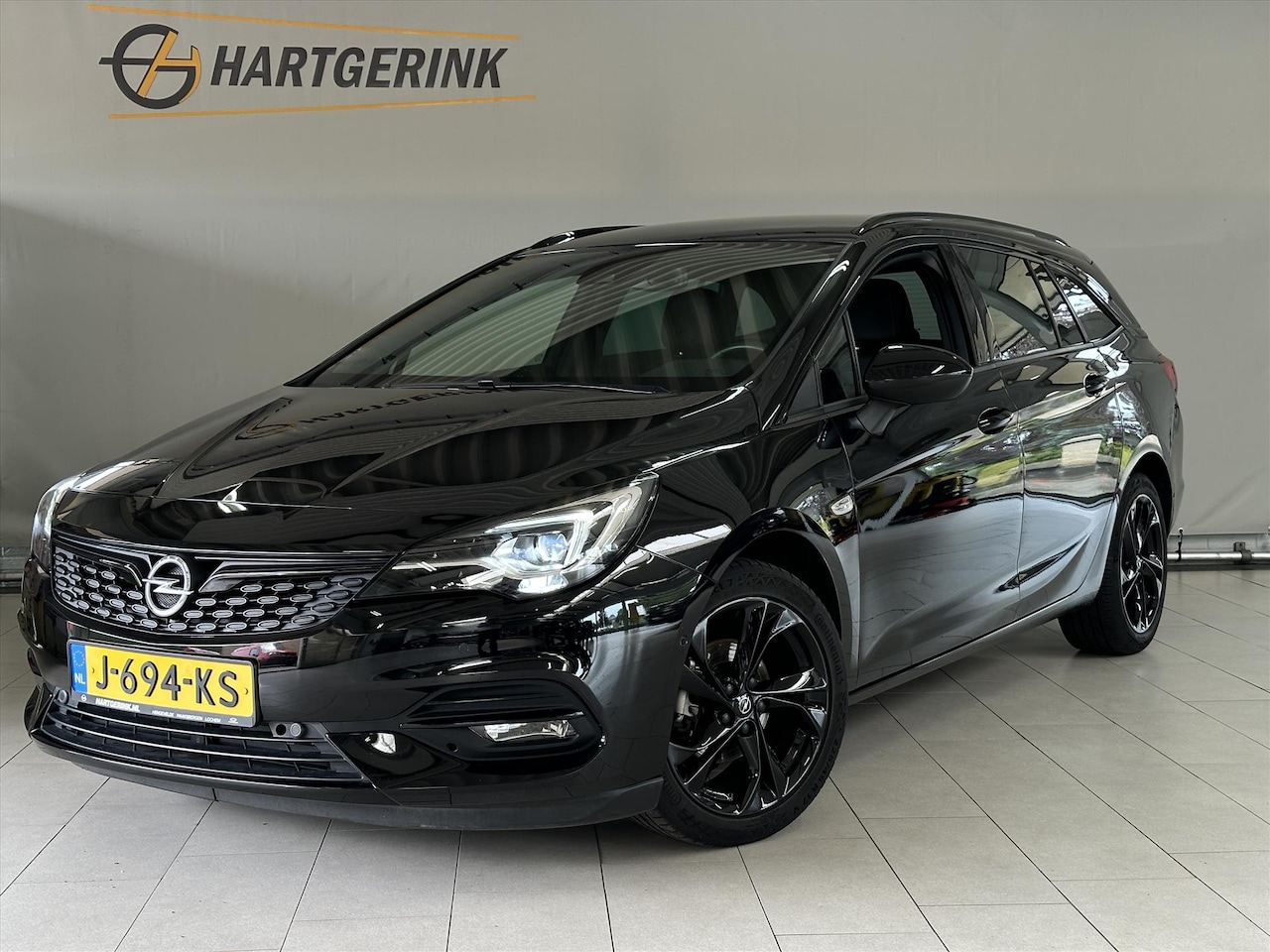 Opel Astra Sports Tourer - 1.2 Turbo 145pk Ultimate* Airco / A-Cruise / Navi / Alcantara / PDC / Keyless Entry - AutoWereld.nl