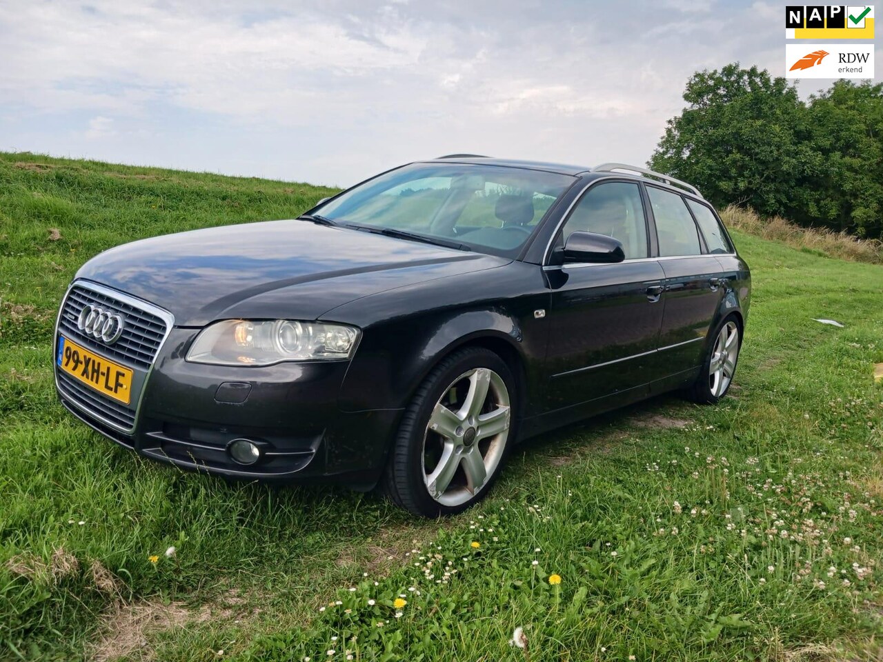 Audi A4 Avant - 2.0 TFSI Quattro Advance Automaat Flippers Navi Leer Climate Cruise Control Afneembare tre - AutoWereld.nl