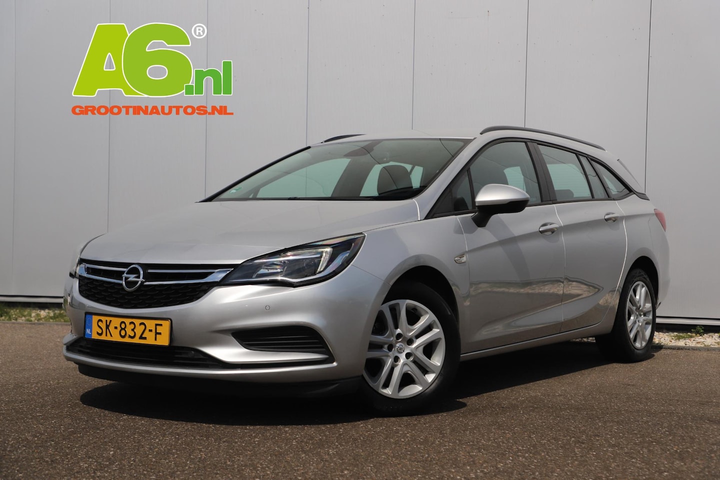 Opel Astra Sports Tourer - 1.0 Online Edition 105PK Automaat Navigatie Airco Cruise PDC Bluetooth Carplay Android - AutoWereld.nl