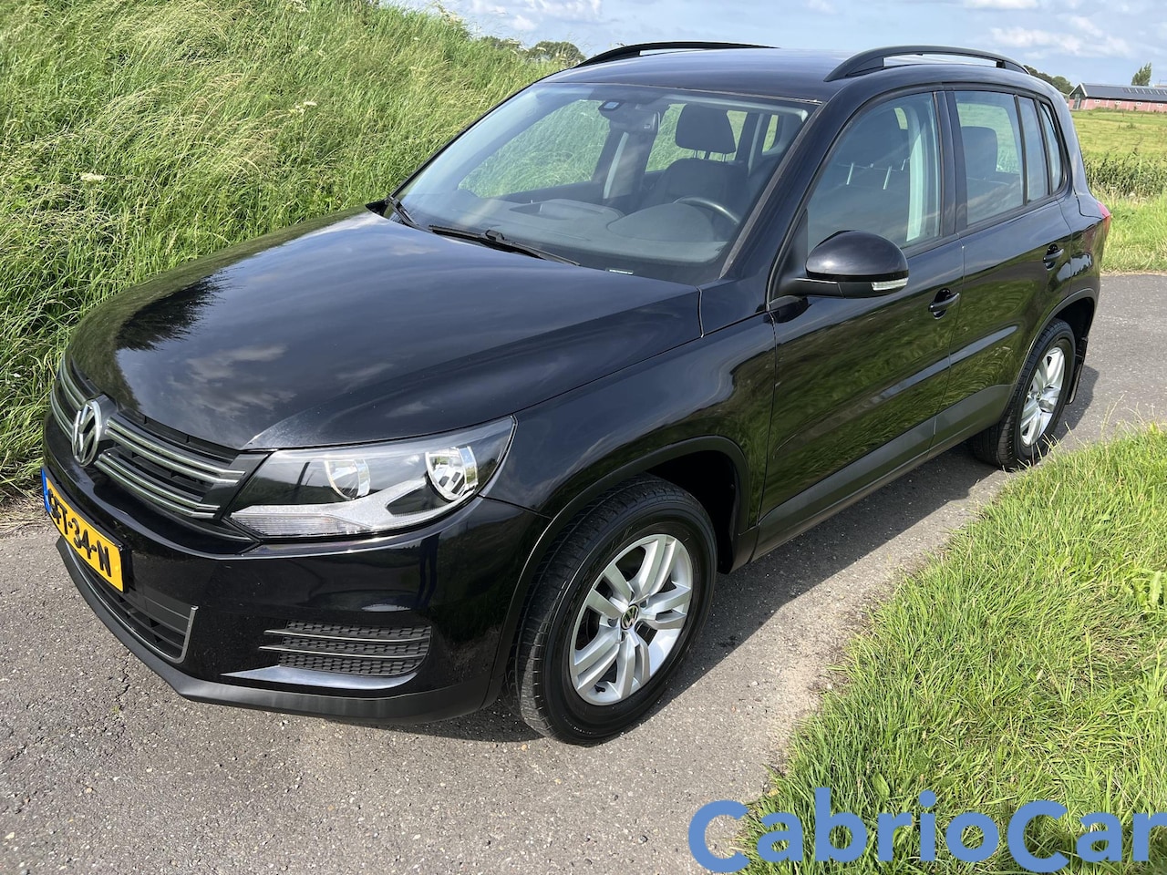 Volkswagen Tiguan - 2.0 TSI Sport&Style 4Motion - AutoWereld.nl