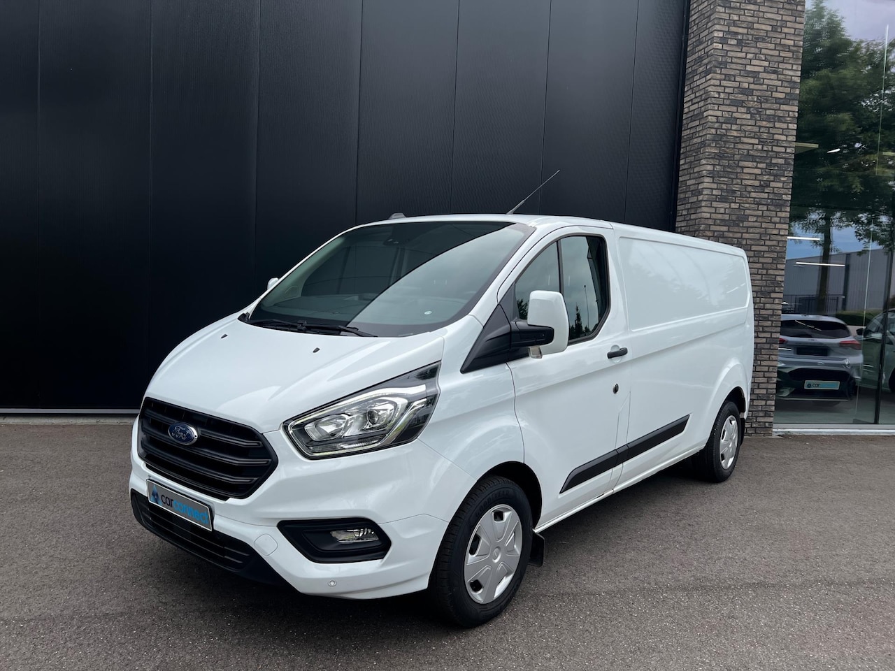 Ford Transit Custom - 320 2.0 TDCI 130pk L2H1 Trend Navi, PDC, Camera, Winter pack etc. etc. - AutoWereld.nl