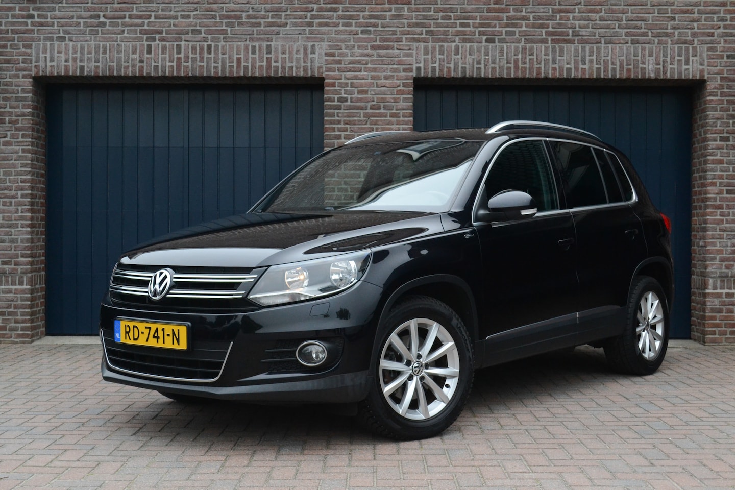 Volkswagen Tiguan - 1.4 TSI Sport&Style Lounge | Camera | Navigatie | Stoelverwarming | Cruise | Clima - AutoWereld.nl