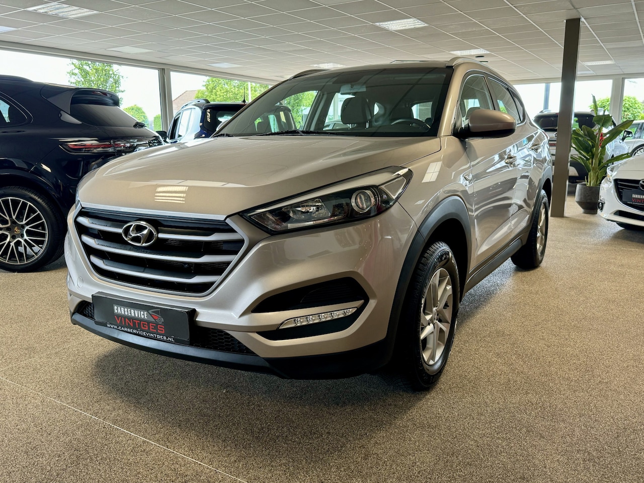 Hyundai Tucson - 1.6 GDi Comfort PDC, Navi, L/m velgen! - AutoWereld.nl