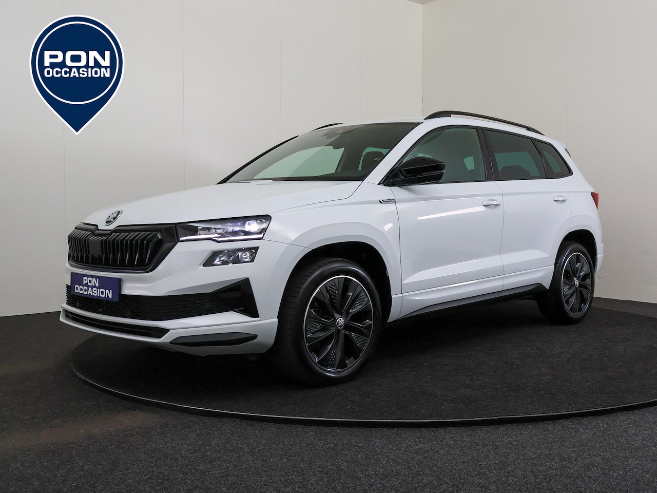 Skoda Karoq - 1.5 TSI ACT 150 PK DSG Sportline Business | Apple CarPlay | Getint Glas | Adaptive Cruise - AutoWereld.nl